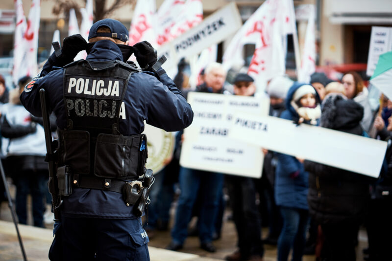 Polish police department securing demonstration on city streets